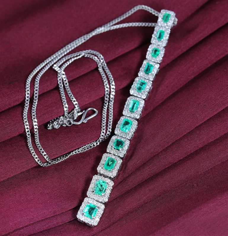 14 K White Gold Emerald and Diamond Pendent Necklace